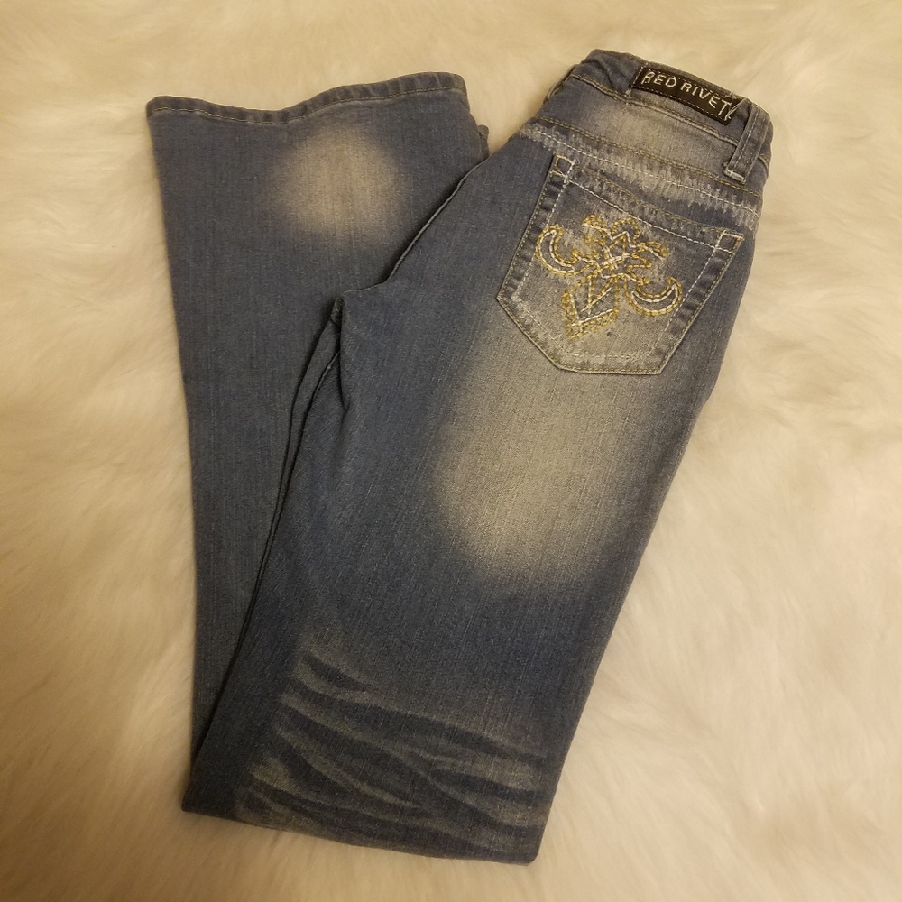 RED RIVET FLARE JEANS